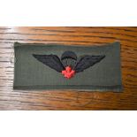 Canadian Service Dress Cloth Paratroop Wings with red maple leaf.