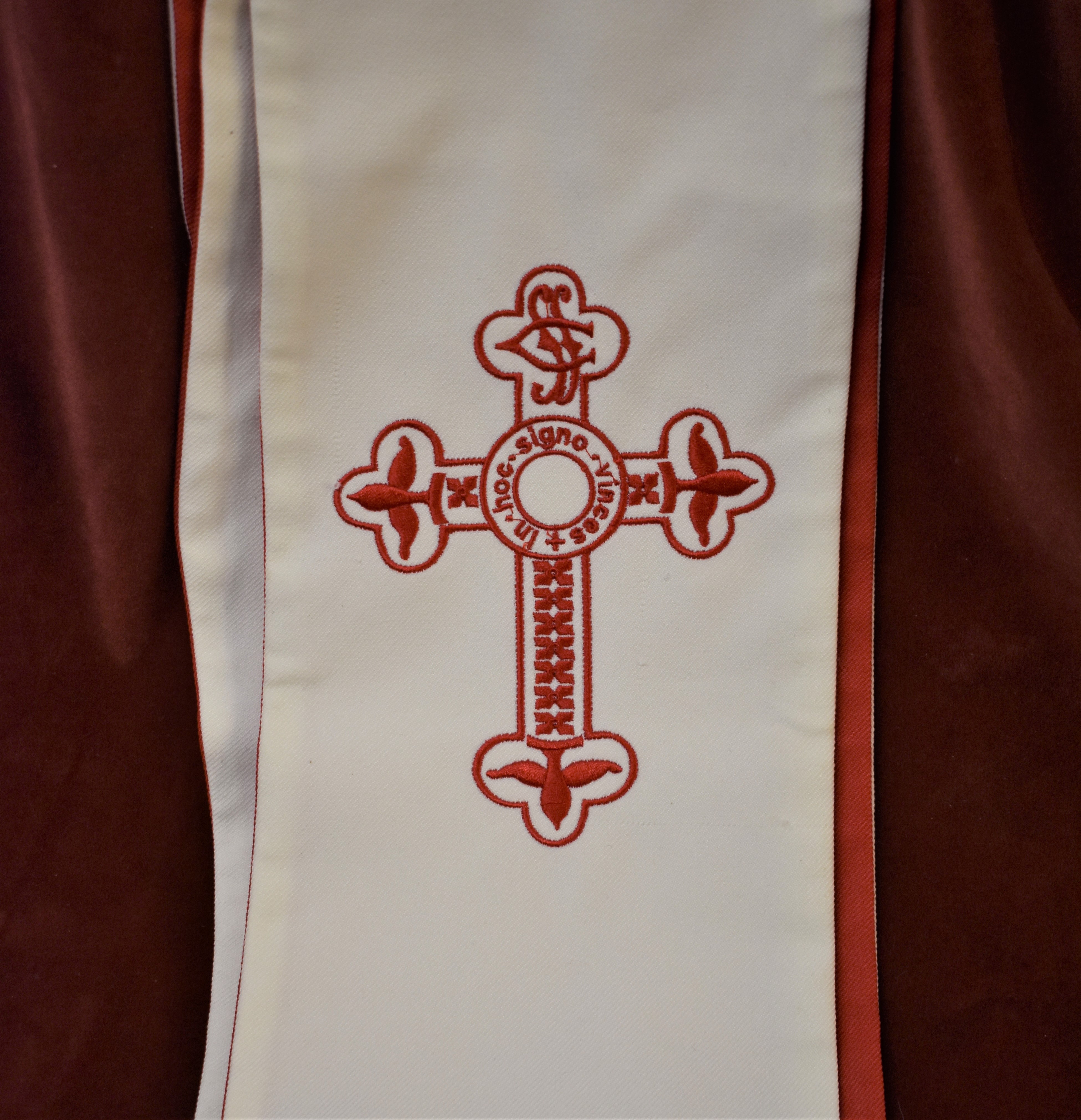 Red and White long, thick stole used for Christmas season. Beautiful embroidered cross on bottoms