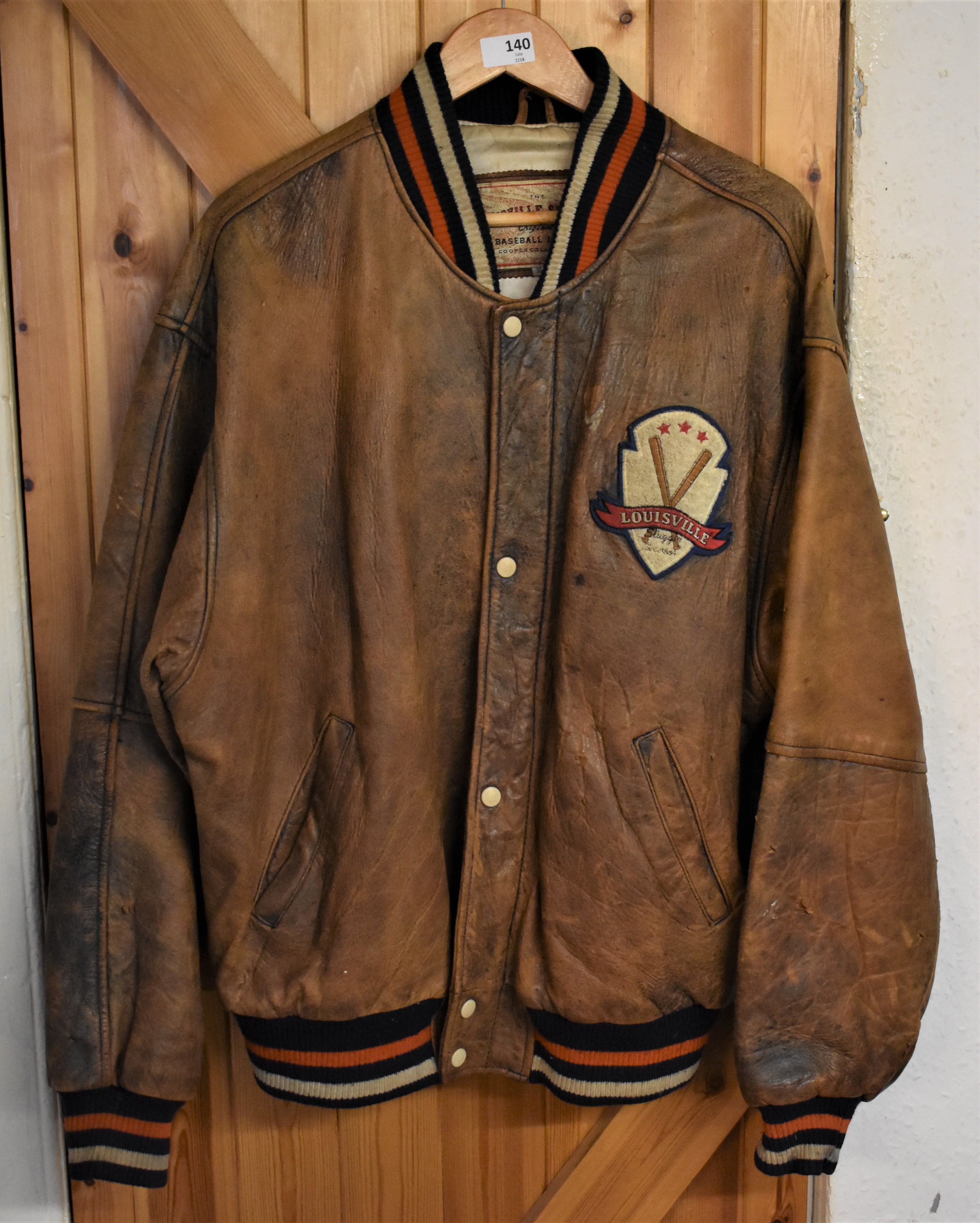 American 1990s Louisville Slugger Baseball Jacket, in worn condition in Size XL. Nice Americana