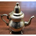 Turkish/Arabic style White Metal Tea Pot. Decorative floral design. Makers stamp on bottom, elephant