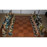 Fantasy Chess Set, complete in a box. Has been used with minor defects, made from plaster it had