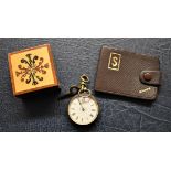 Leather Stamp Case - A boxed ring, yellow and white stones, with a built in re-sizer, and a ladies