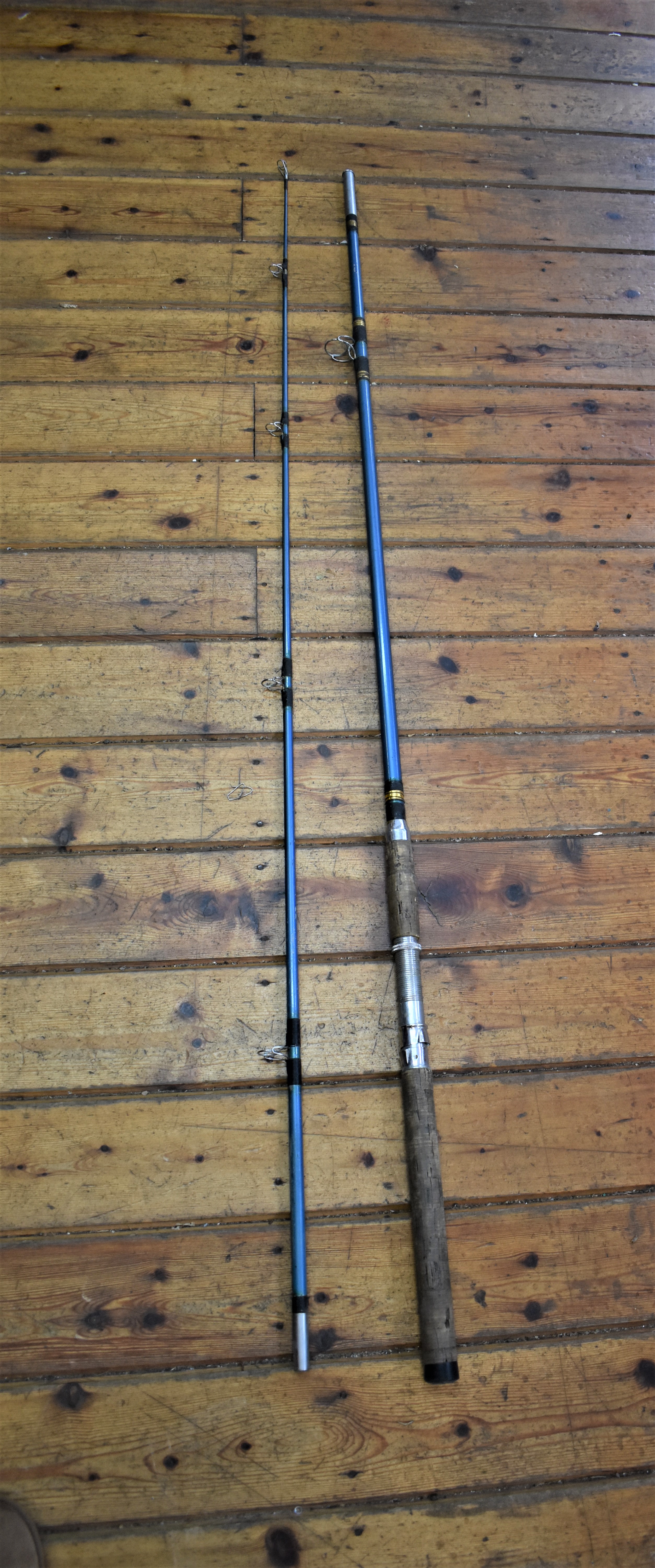 Vintage Cork handled sea fishing rod. 9-foot length in cloth case