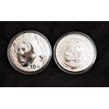 China 2002 and 2009 10 Yuan, Silver Proof Pandas (2) encased