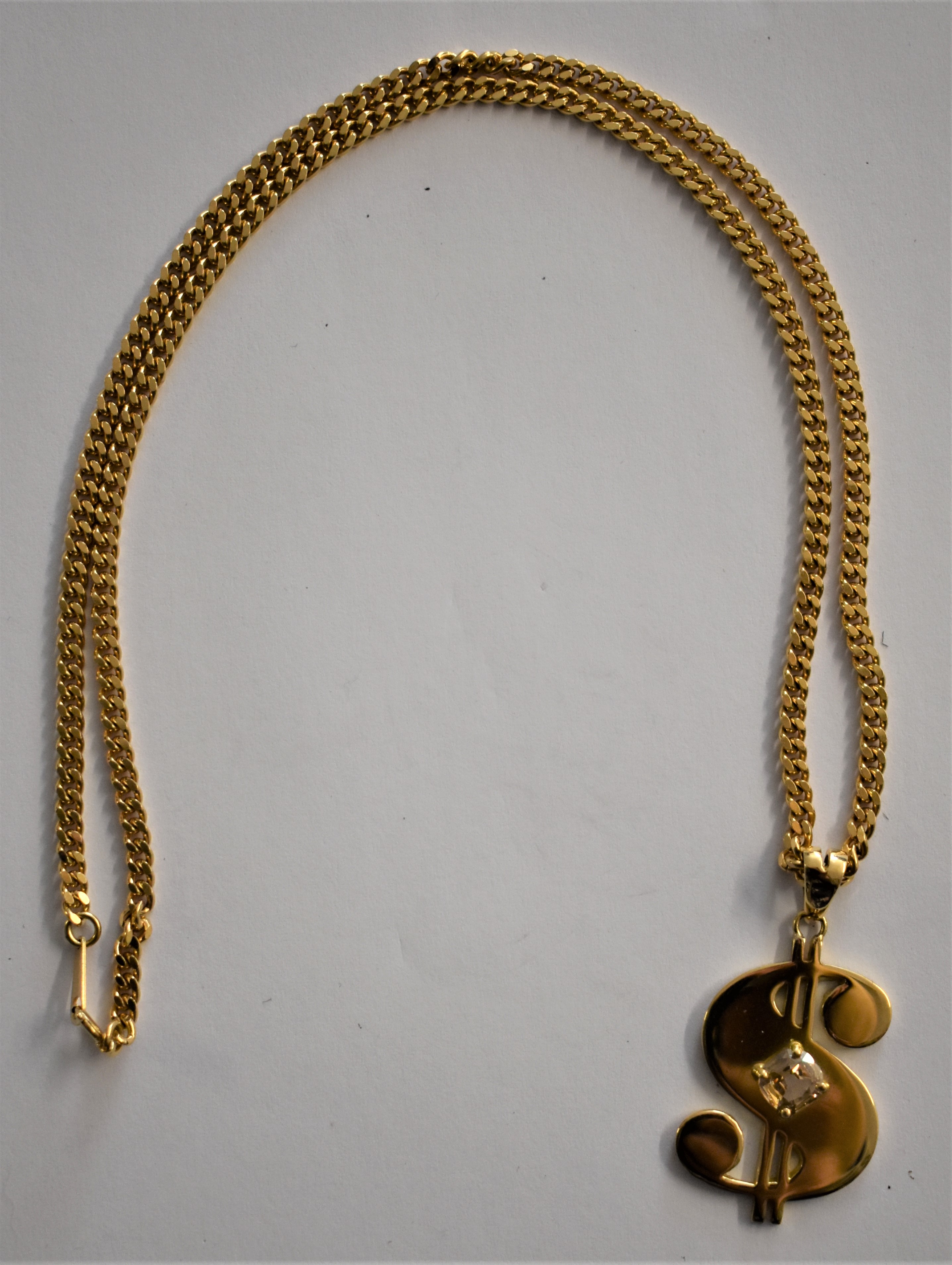 Gold Necklace 18ct Gold, chain and a 18ct Dollar Sign Pendant (30gm's)