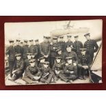 HMS Cleopatra Inter-War Royal Marines RP Postcard, shows the ships division with many Cadet