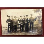 Royal Fusiliers Bandmen RP Card showing the men in camp, News bulletin in the background Will L.G.G,