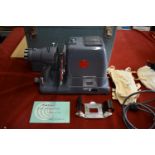 Ebata Model 500 Slide Projector, F/3.0 Projection lens and takes 6cmx6cm slides and 35mm strip