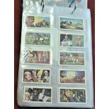 Cigarette Cards: Circus Fables, Tricks & Disney. A collection in an album in sleeves, mixed old