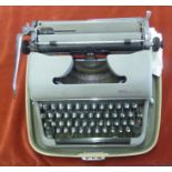 Olympia West German 1950s SM De Luxe Typewriter with case, immaculate condition. In excellent