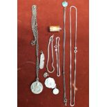 Assorted jewellery with necklaces, wrist bands and silver charms