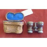 Victorian binoculars or opera glasses with original brown leather case with metal clasp. Leather