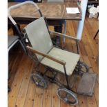 British WWI/II Allwin standard No.2 foldable wheelchair, a sturdy chair with a fabric seat