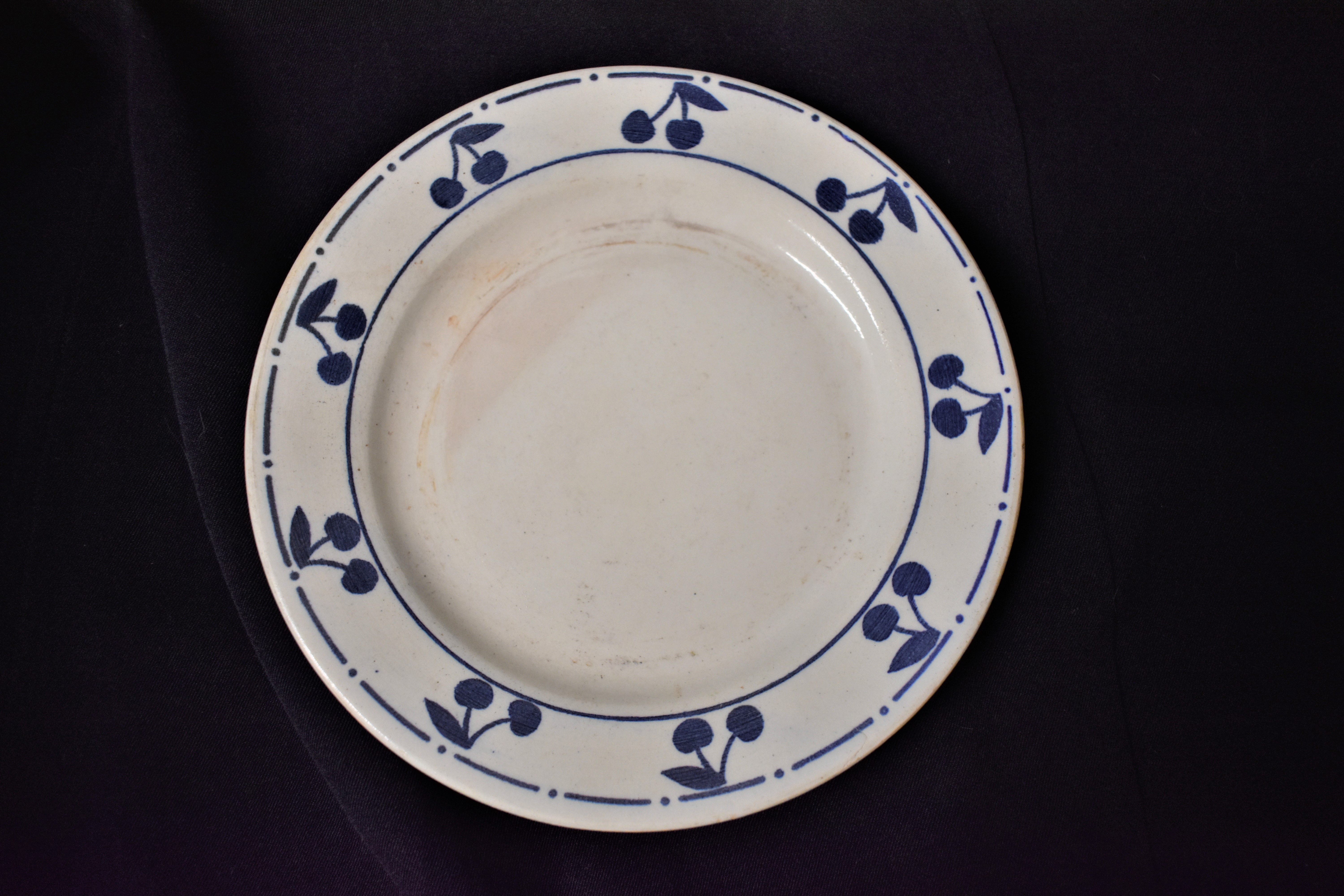 German WWII Tea Plate with an nice design of blue cherries, the base stamp with the design s of