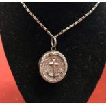 British Royal Navy Silver Locket with a beautiful design of an anchor surrounded by ocean waves