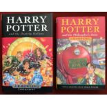 Harry Potter and the Philosopher's Stone hardback ISBN 0747532699 and Harry Potter and the Deathly