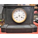 An antique Black Slate 8 Day Clock, in need of restoration. Buyer Collects as it is incredibly