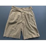 British Forces shorts, drill khaki. 1950 pattern, Size 7, 31-33" waist. Good worn condition. Made