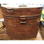 A Large Metal Oval Antique Hat Tin 13" x 17" x 13" with original painted exterior and blue interior