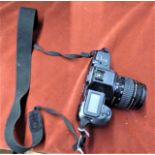 Canon EOS 600 Autofocus SLR Film Camera Body semi pro camera with a 35-105mm Ultrasonic Canon Zoom