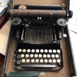 An Antique Corona typewriter believed model No.3 Portable circa 1920 in black case (some woodworm