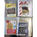 Collection of football programmes in three albums, wide ranging 1980s on. Carton. Qty. Buyer