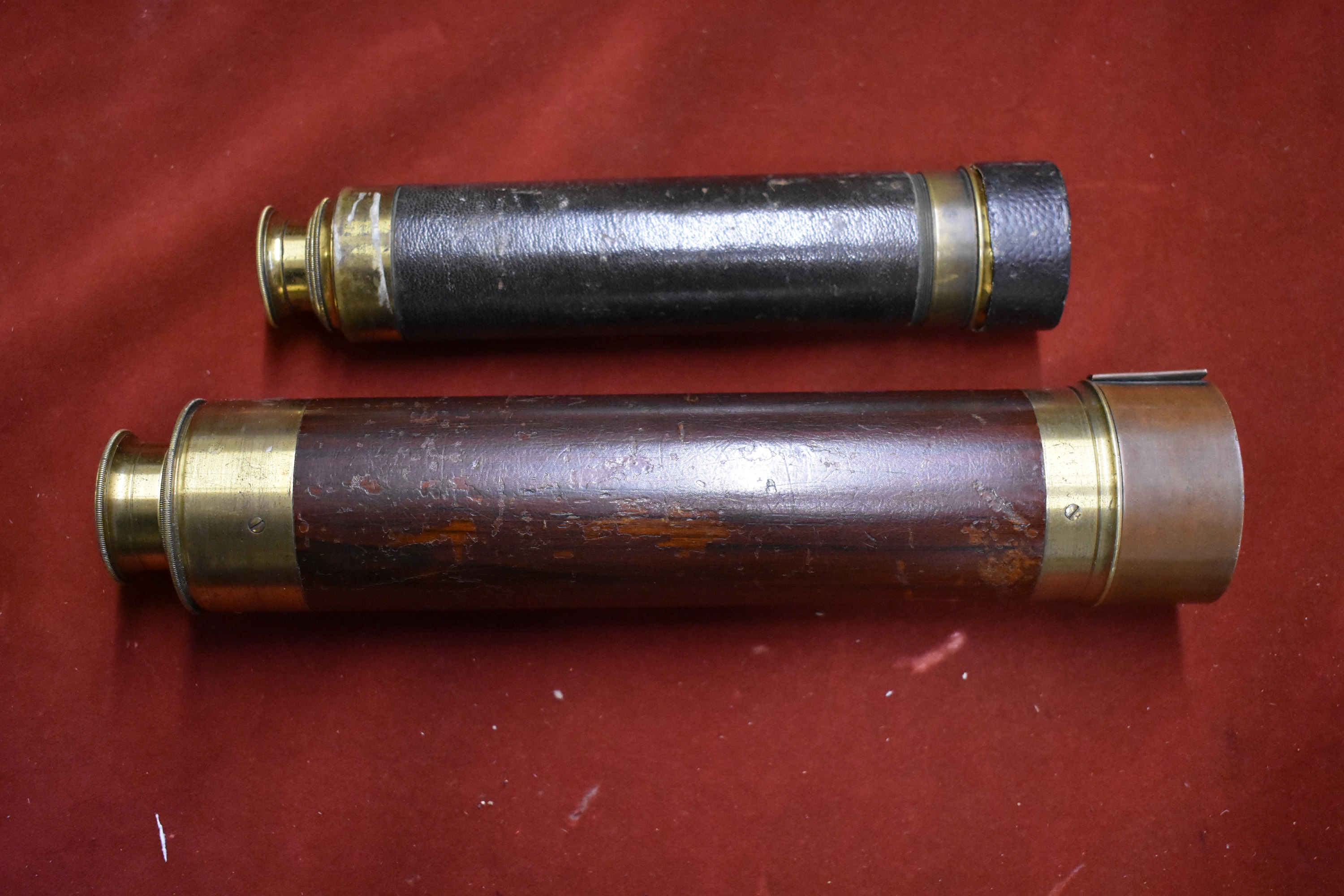 British Military/Nautical 19th century mahogany cased and brass mounted telescopes (2). One is a
