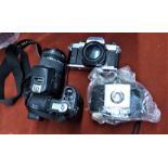 Used lot of unusual cameras. Sony Cybershot DSC-F828, Kodak Brownie 127, and Olympus OM20. All for