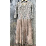 Elegant 1950s custom made dress at Dickens & Jones, London Heavy lace bodice with soft pleated sheer