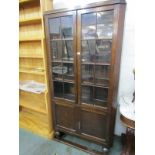 EDWARDIAN OAK GLAZED BOOKCASE, twin door cupboard base, 72" height 36" width