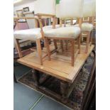 VINTAGE OAK DINING SUITE, oak draw leaf dining table on 4 pillar stretcher supports, together with