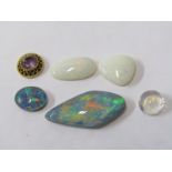 A SELECTION OF LOOSE STONES, including opal, moon stone etc