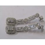 A PAIR OF 18ct WHITE GOLD DIAMOND DROP EARRINGS, Mixed cuts, baguette and brilliant cut forming a