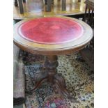 VICTORIAN WALNUT SUPPER TABLE, a fine scroll carved tripod base with tapering pedestal and leather