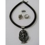 TWO SILVER RINGS & A SILVER PENDANT, depicting an Egyptian pharaoh on a leather collar style