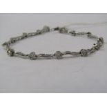 18ct WHITE GOLD DIAMOND BRACELET, unusual floral design diamond cluster totalling approx 1.5ct of