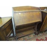 EDWARDIAN OAK BUREAU BOOKCASE, fitted fall front above to open shelf base, 34" width