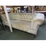 CHESTERFIELD, buttonback upholstered 3 seater Chesterfield with original castors