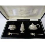 INDIAN SILVER CRUET, 3 piece silver cruet set, bodies decorated lions and tigers in continuous