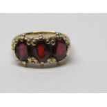 9CT YELLOW GOLD 3 STONE GARNET RING, 3 principal oval cut garnets of good colour, in 9ct yellow gold