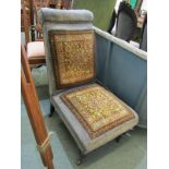 EDWARDIAN NURSING CHAIR, original carpet panel seat and back rest, with original castors