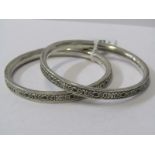 TWO SILVER BANGLES, With abstract design