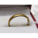 22CT YELLOW GOLD WEDDING STYLE BAND, approximately 4 grms in weight, size O