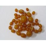 GRADUATED AMBER BEAD NECKLACE, needs restringing, untested graduated oval beads, 32.8 grms total