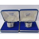 SILVER NAPKIN RINGS, pair of heavy silver napkin rings, Sheffield 1977 in fitted boxes, maker F H,