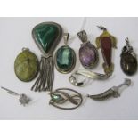 A SELECTION OF SILVER ITEMS, including pendants, brooches etc, some stone set, organic and