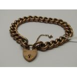 VINTAGE 9CT ROSE GOLD HOLLOW CURB LINK CHARM STYLE BRACELET, with padlock clasp, approximately 18