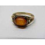 9CT YELLOW GOLD ORANGE STONE POSSIBLY CITRINE RING, cabochon cut, size L/M