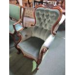 VICTORIAN BUTTONBACK GENTLEMAN'S ARMCHAIR, floral carved scroll legs and pierced and carved cresting