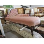 VICTORIAN CHAISE LONGUE, pink button back upholstery with floral carved cabriole legs and scroll arm